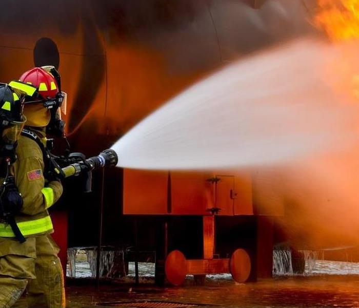 Firefighter fighting fire