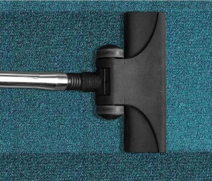 Vacuum going over carpet
